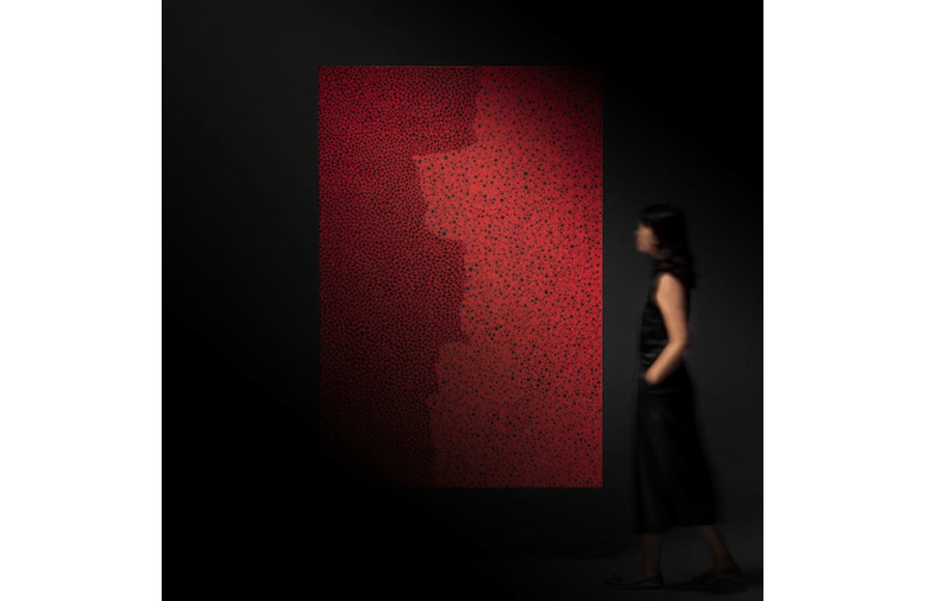 A red and black abstract painting on a black background.